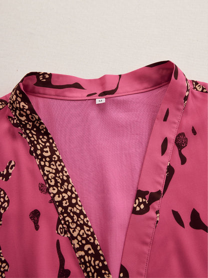 Michelle | Eleganter Langarm-Jumpsuit mit weitem Bein und Leopardenmuster
